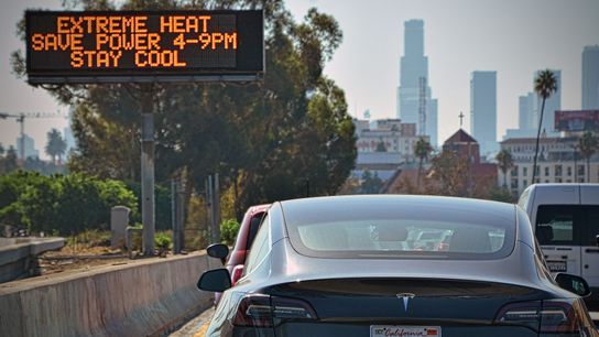Cars pass an extreme heat warning in California. Urban heat island impacts are especially devastating to the health of vulnerable populations. Cars pass an extreme heat warning in California. Urban heat island impacts are especially devastating to the health of vulnerable populations.