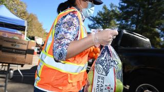 An Unlikely Line of Defense During Heat Waves: Food Banks (news). Photo by Robyn Beck / Contributor / Getty Images via Grist