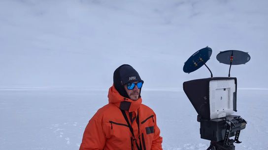 Matthew Boyer pilots a data-collecting drone. Matthew Boyer pilots a data-collecting drone.