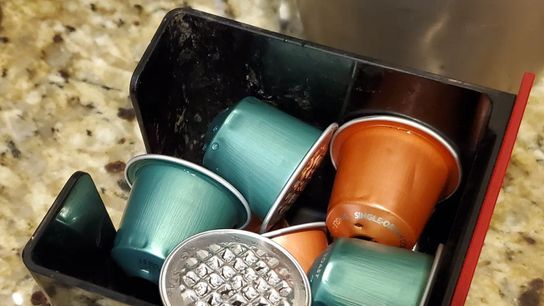 Nespresso instructs consumers to recycle their used coffee pods as is, grounds and all.