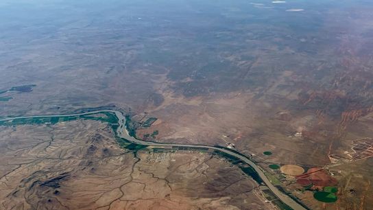 The Orange River cuts through the dry plains of the southern Kalahari.