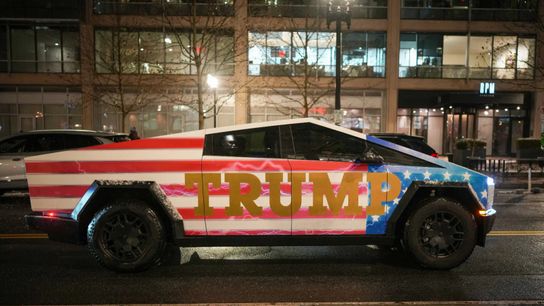 A Donald Trump-themed Tesla Cybertruck sits in traffic in Washington, D.C. A Donald Trump-themed Tesla Cybertruck sits in traffic in Washington, D.C.