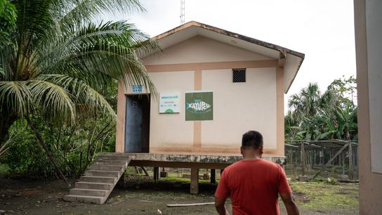 Rider Gais, president of the Kachizpani Artisanal Fishermen’s Association, at the community’s fish preservation facility.